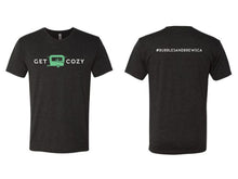 Load image into Gallery viewer, Vintage Black Short Sleeve Tshirt with Get Cozy text and green icon on front and your hashtag on the back
