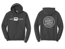 Load image into Gallery viewer, Hoodie with White Get Cozy text and Caravan icon on front and B&amp;B round logo on the back
